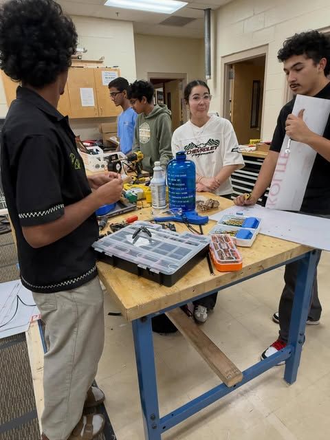 Camber Robotics students collaborating on their robot